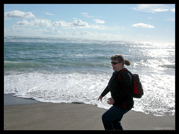 That’s me!  There I go, making a mad dash to keep my feet dry from an incoming wave!